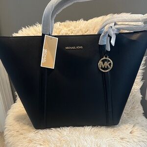 Michael Kors Black Tote with Gold Accents